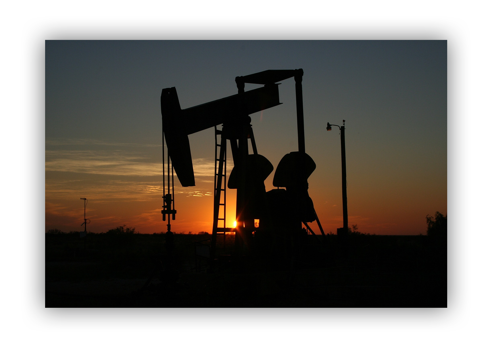 oil and gas drilling at dusk